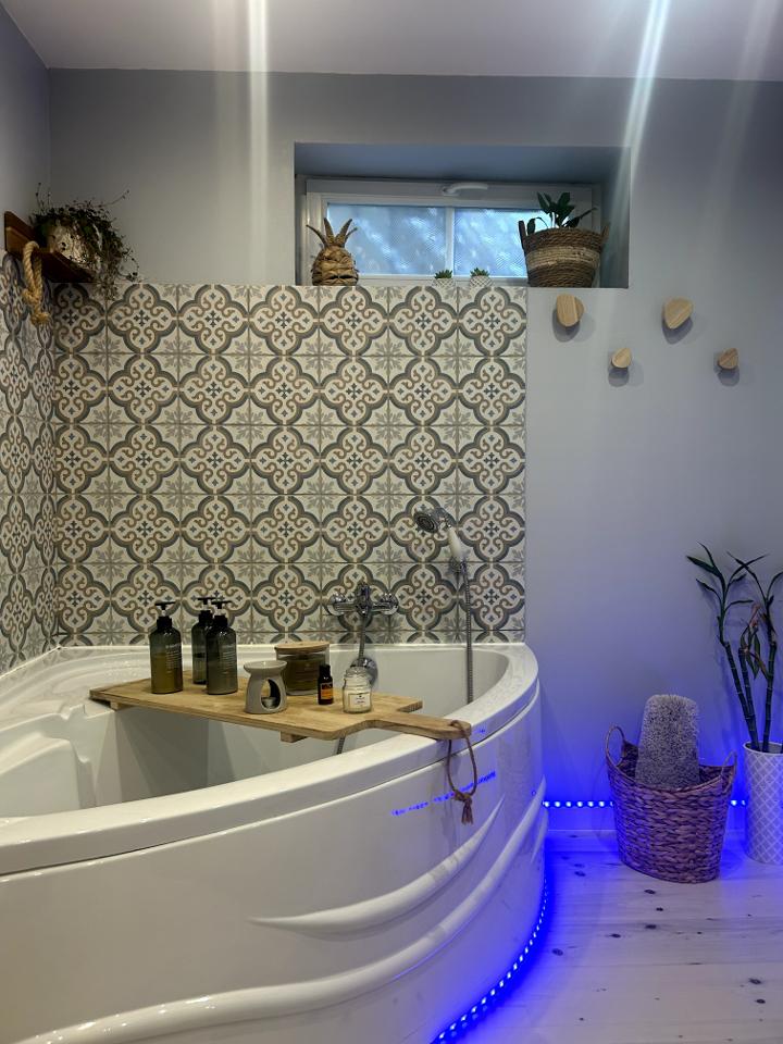 GreenGo Suite bien-être, baignoire spa et ambiance bohème : une Bulle d'Évidence