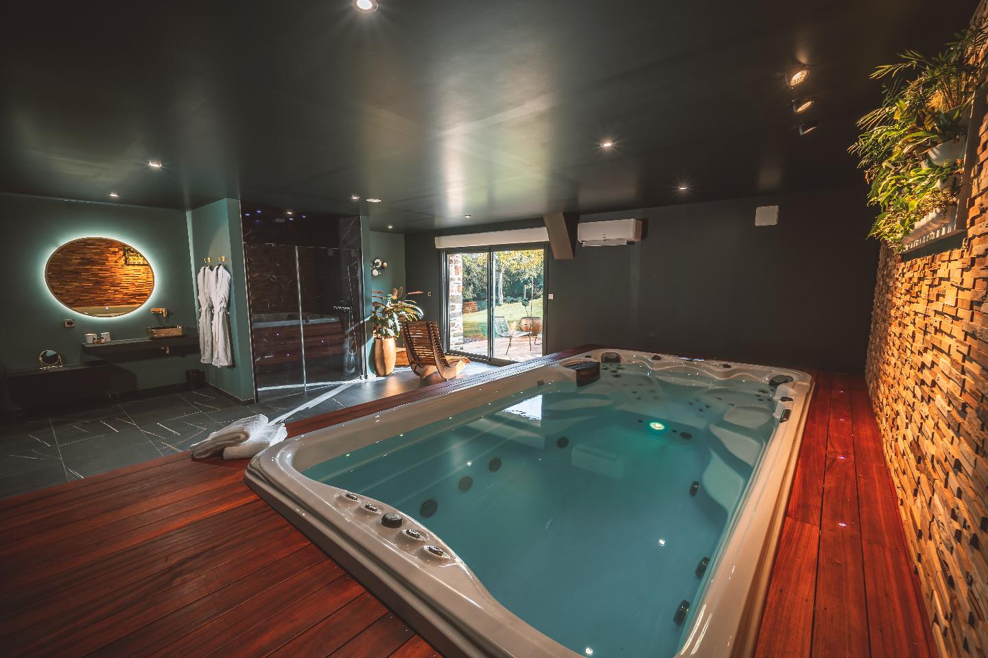 Le Secret de l’Élixir – Suite romantique avec spa privatif en Bretagne