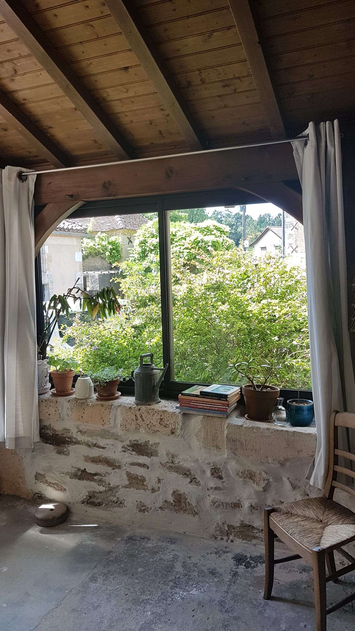 Véranda ouverte sur le jardin