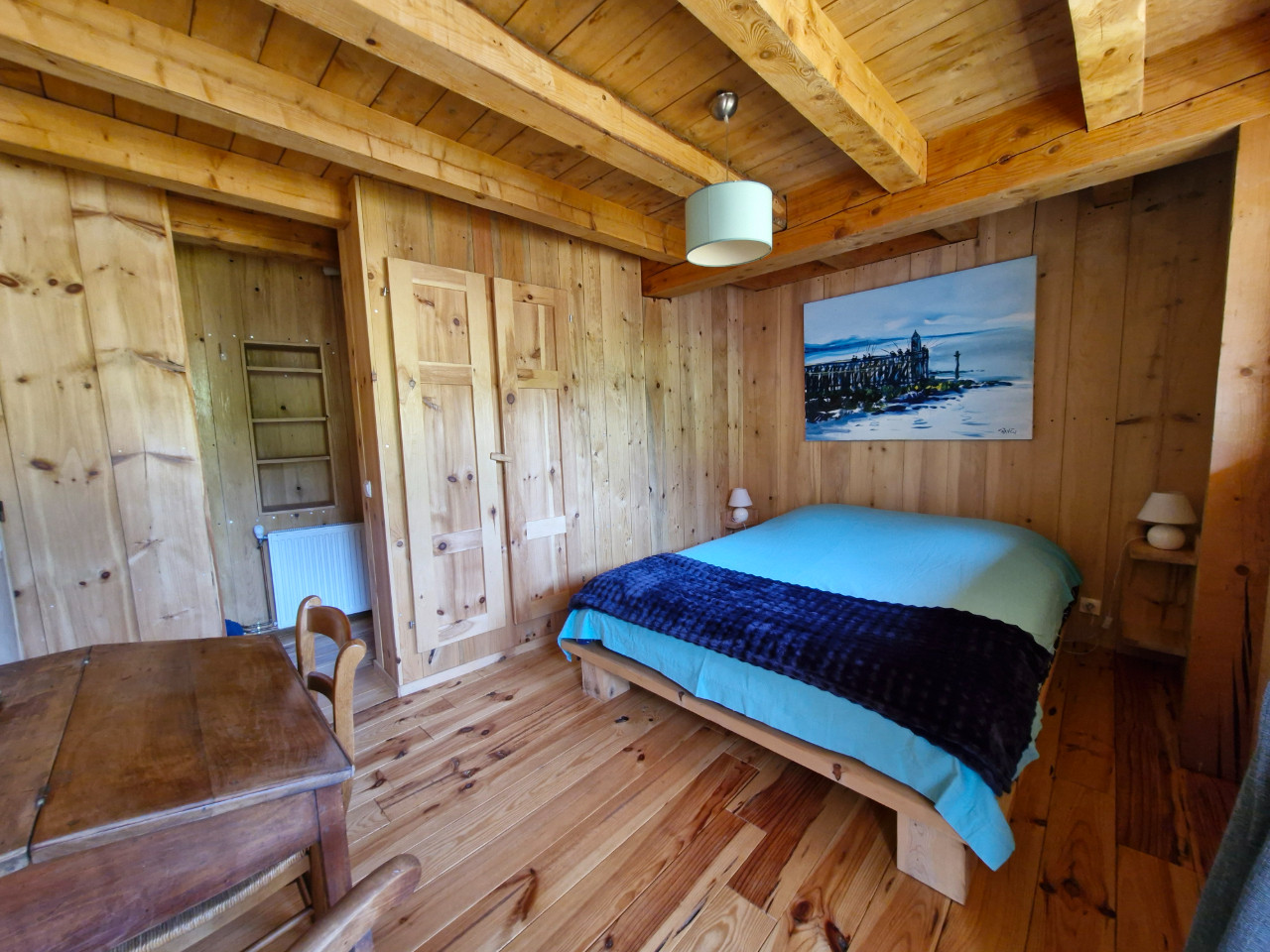 GreenGo Une chambre en bois dans une maison tout en bois