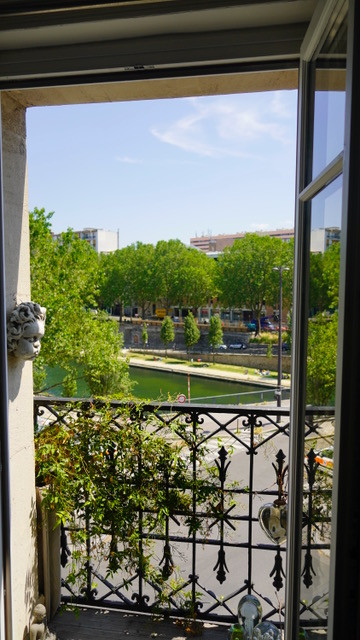 Campagne à Paris Vue sur l'eau, les arbres, le ciel