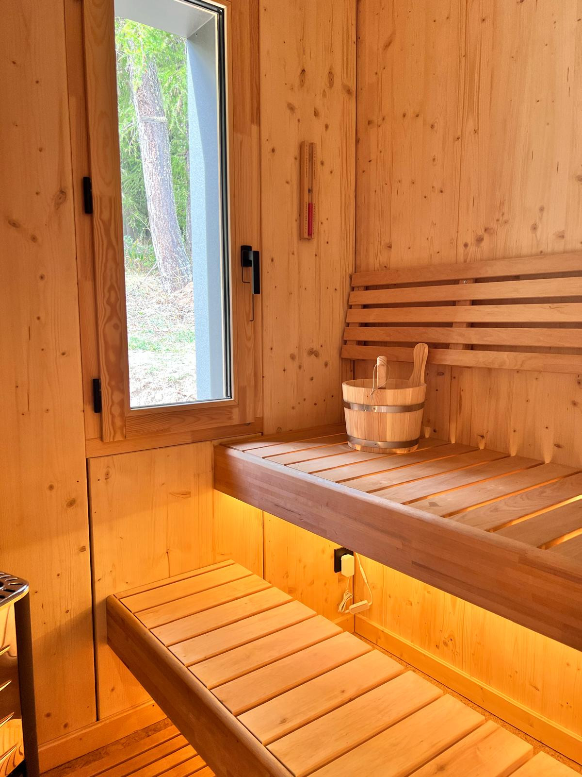 Un sauna finlandais privatif dans chaque cabane